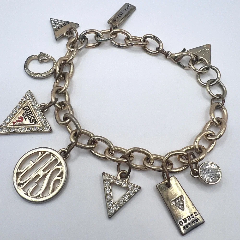 GUESS Vintage Gold Tone Charm Bracelet Rhinestone Logo Est 1981 Y2K Signed